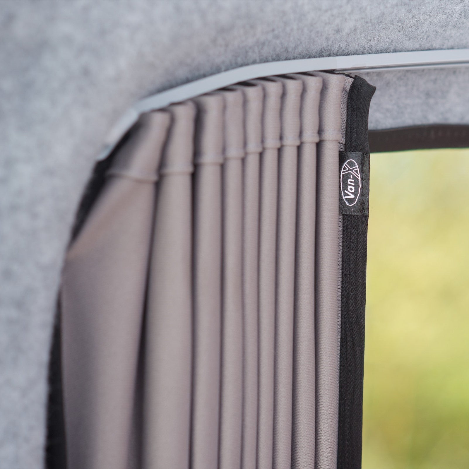 A close up of curtains in a campervan